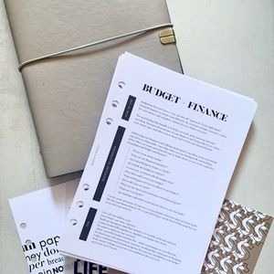 Cloth and paper financial agenda/planner